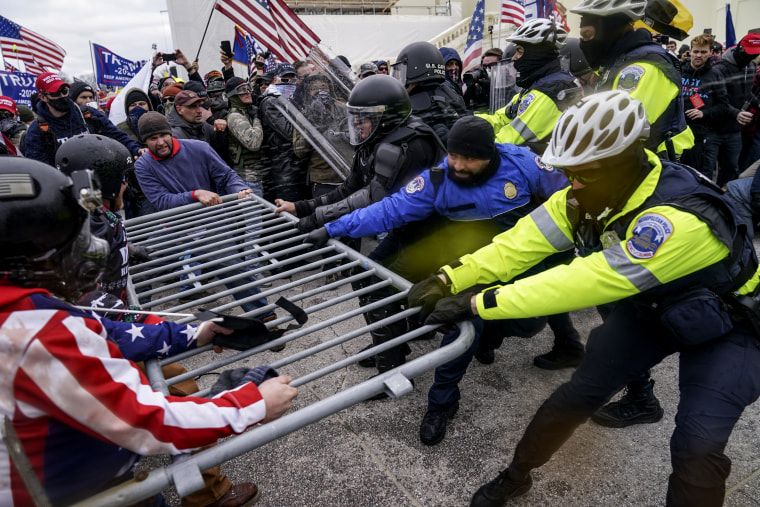 210106-capitol-protest-police-barricades-cs.jpg