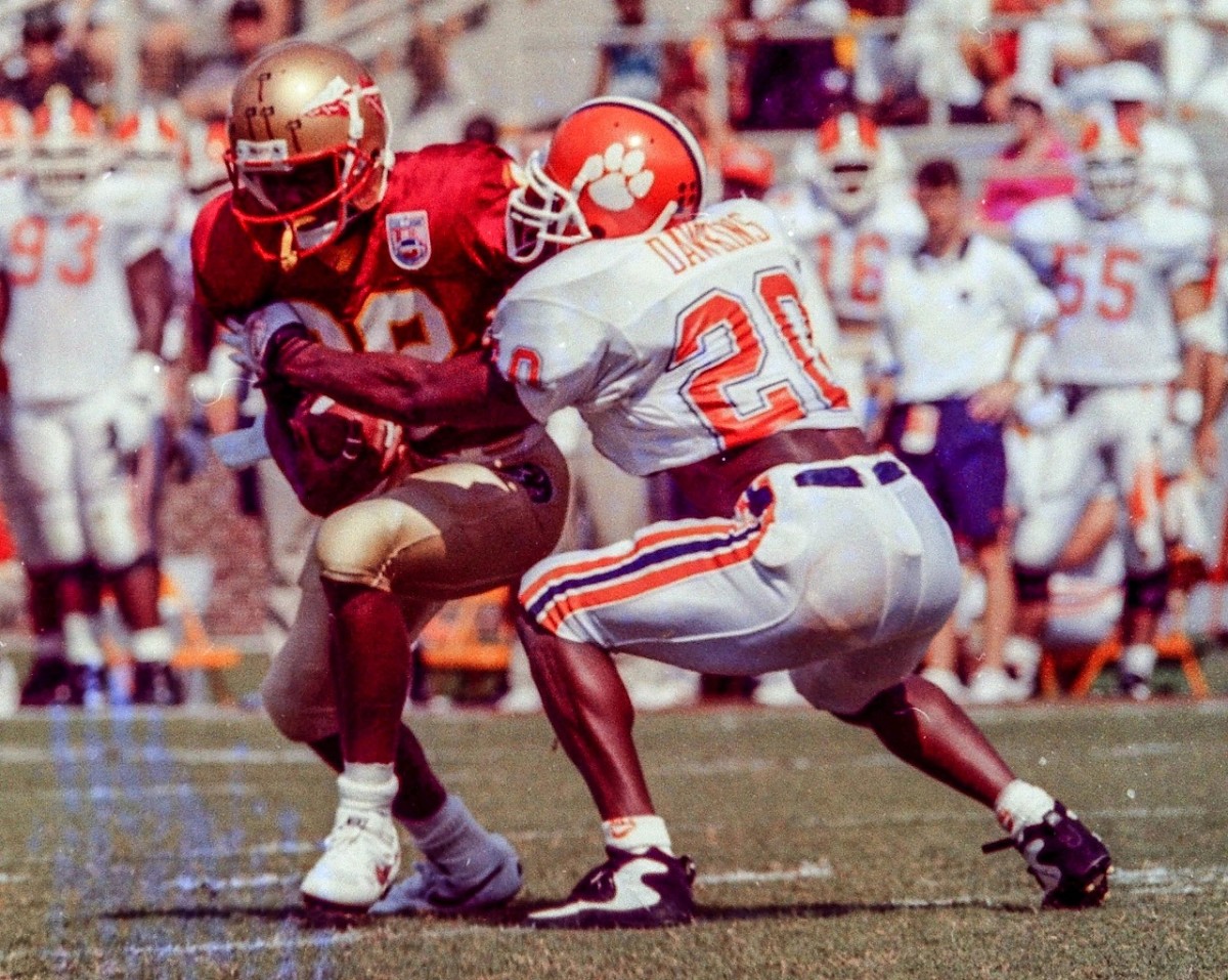 Clemson's Brian Dawkins tackles Florida State's Warrick Dunn in the Tiger's 1994 trip to Tallahassee. 