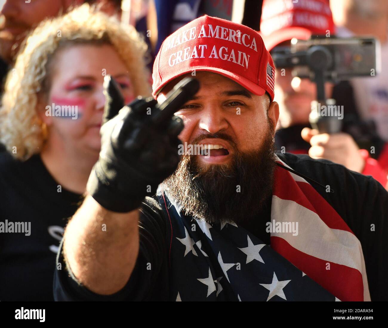 washington-district-of-columbia-usa-14th-nov-2020-washington-dc-111420-angry-trump-supporter-screamed-at-anti-trump-protesters-on-14-2020-outside-of-the-supreme-court-justice-building-during-a-day-where-tens-of-thousands-of-trump-supporters-came-to-dc-to-vouch-their-support-for-the-president-credit-essdras-m-suarezzuma-wirealamy-live-news-2DARA54.jpg