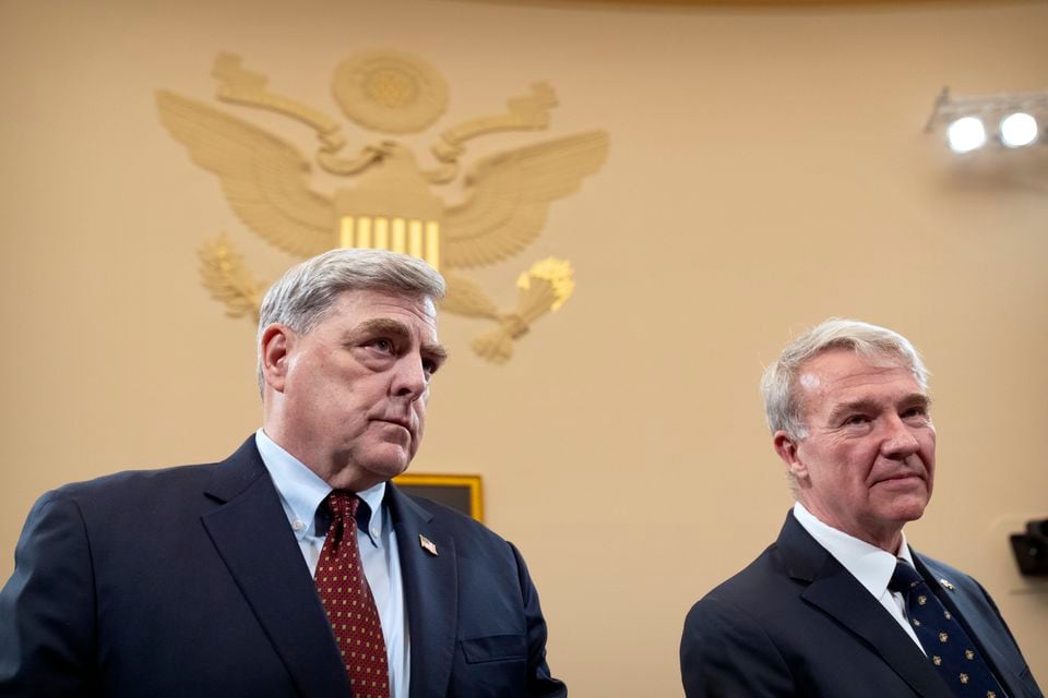 Former Joint Chiefs chairman General Mark Milley (left) and US Central Command retired General Frank McKenzie arrived for their testimony on Tuesday.