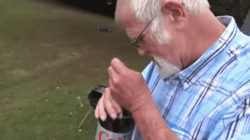 angry-grandpa-got-exploded-by-diet-coke-and-mentos-on-the-face.gif