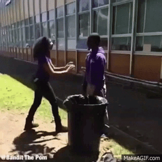 trash-can-fight.gif