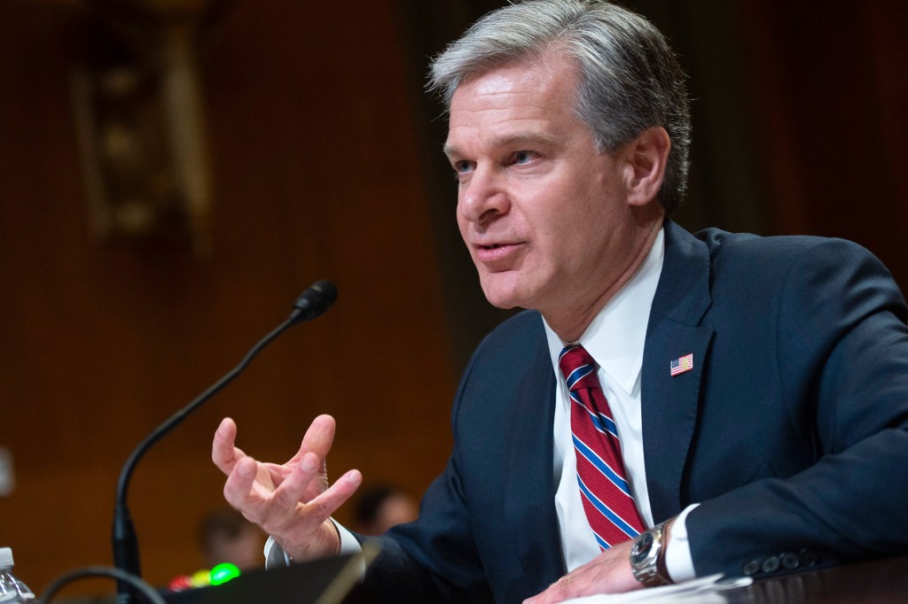 Director of the Federal Bureau of Investigation Christopher Wray testifies during a Senate Appropriations Subcommittee hearing on the fiscal year 2023 budget for the FBI in Washington, DC on Wednesday, May 25, 2022.